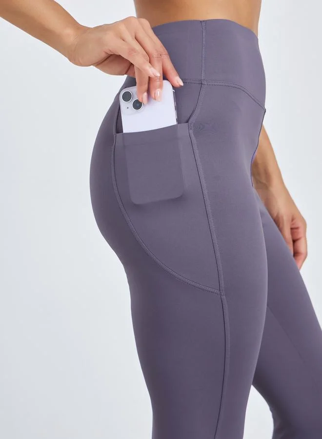 Styli Active Purple Purple Broad Waist Side Pocket Leggings for Women | Best Price UAE