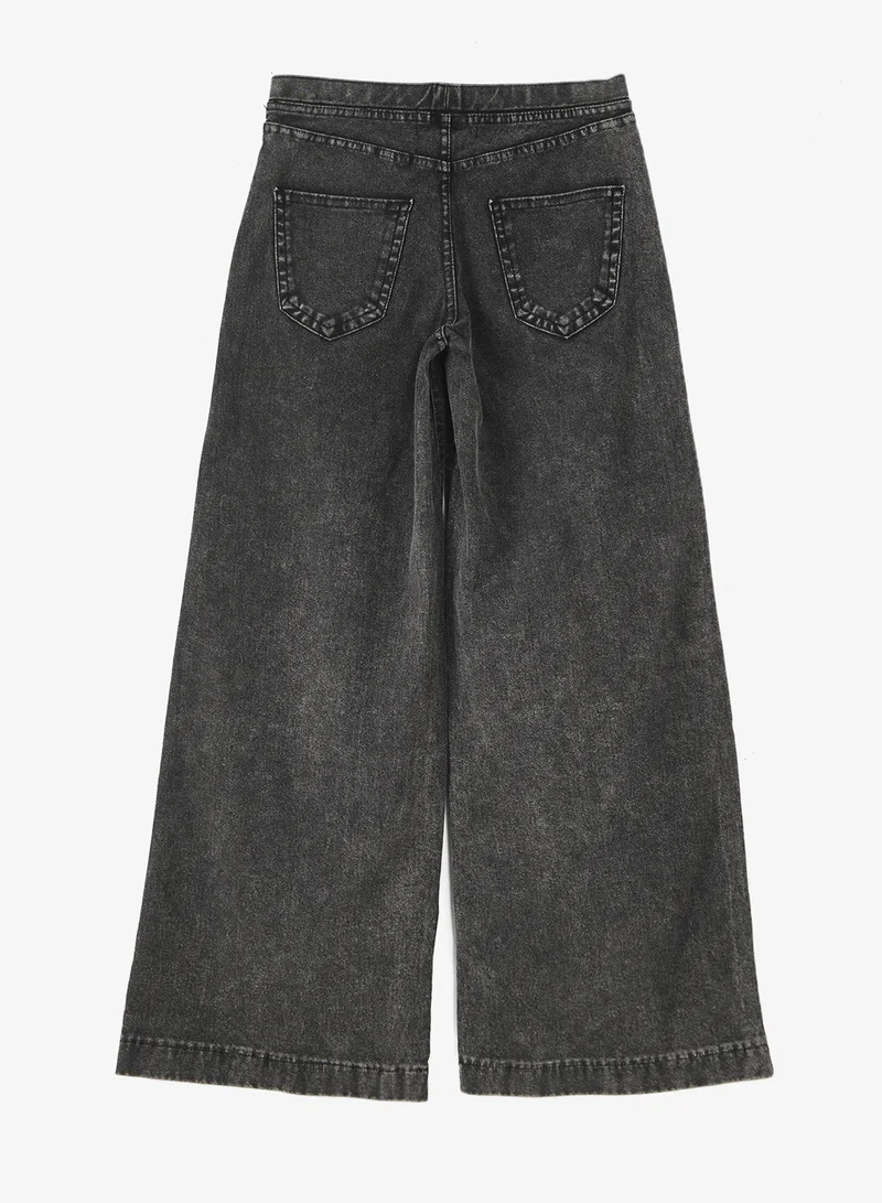 اتش اند ام بنطلون واسع بنمط الدنيم