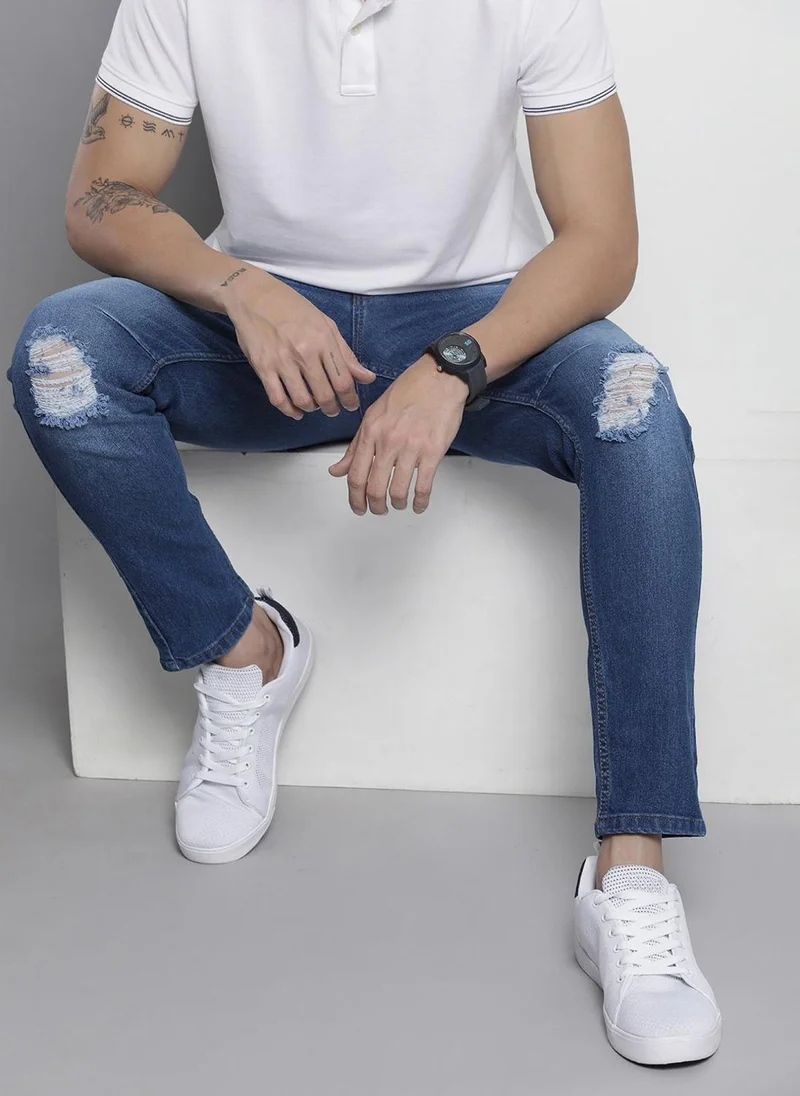 Men Carrot Fit Distressed Mid-Rise Stretchable Jeans