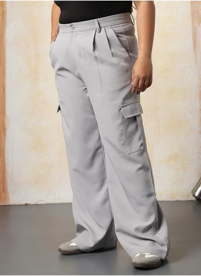 هاي ستار Women Trousers in Grey featuring Wide Leg fit with a solid pattern, regular length, secured with button closure, crafted from 95% polyester 5% spandex – a stylish must-have for any occasion.