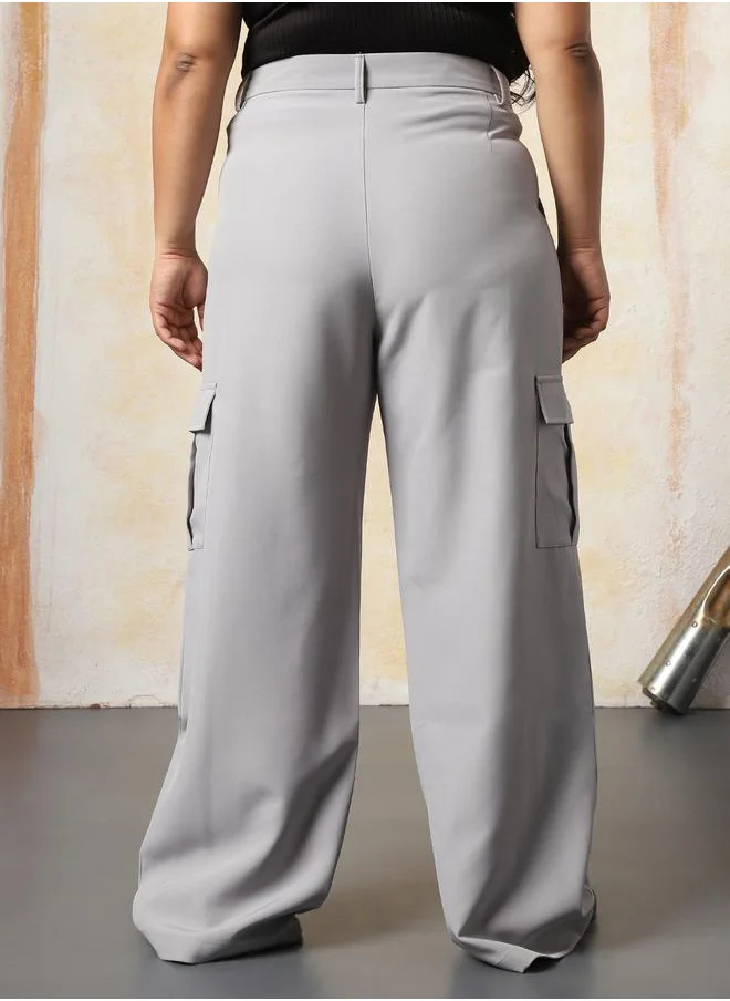 هاي ستار Women Trousers in Grey featuring Wide Leg fit with a solid pattern, regular length, secured with button closure, crafted from 95% polyester 5% spandex – a stylish must-have for any occasion.