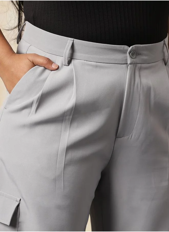 هاي ستار Women Trousers in Grey featuring Wide Leg fit with a solid pattern, regular length, secured with button closure, crafted from 95% polyester 5% spandex – a stylish must-have for any occasion.