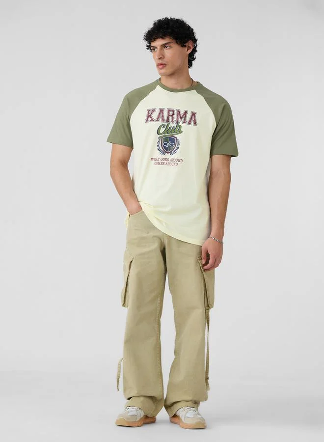 ذا سوليد ستور تيشيرت مطبع بأكمام ريجلان