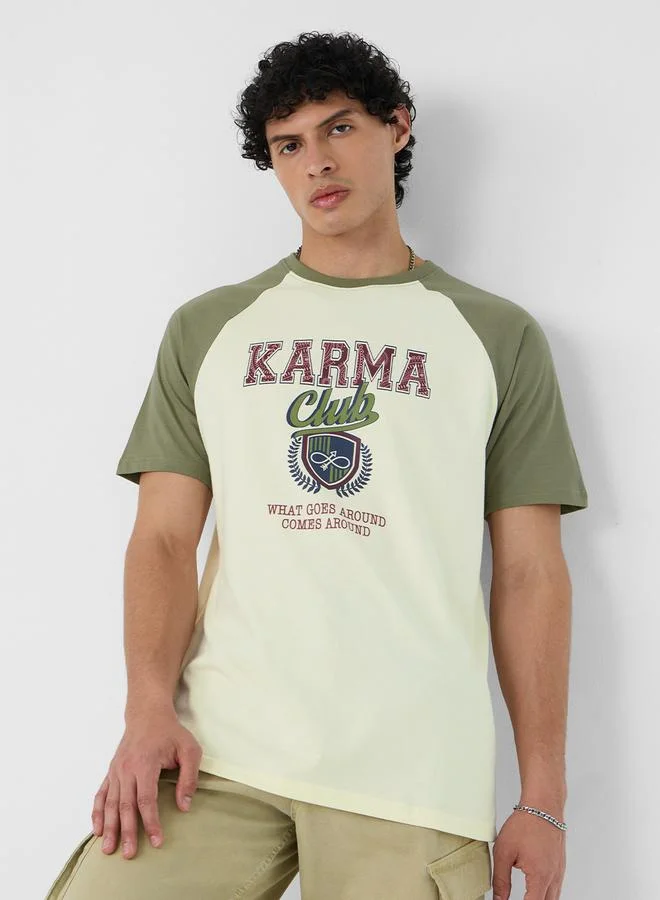 ذا سوليد ستور تيشيرت مطبع بأكمام ريجلان