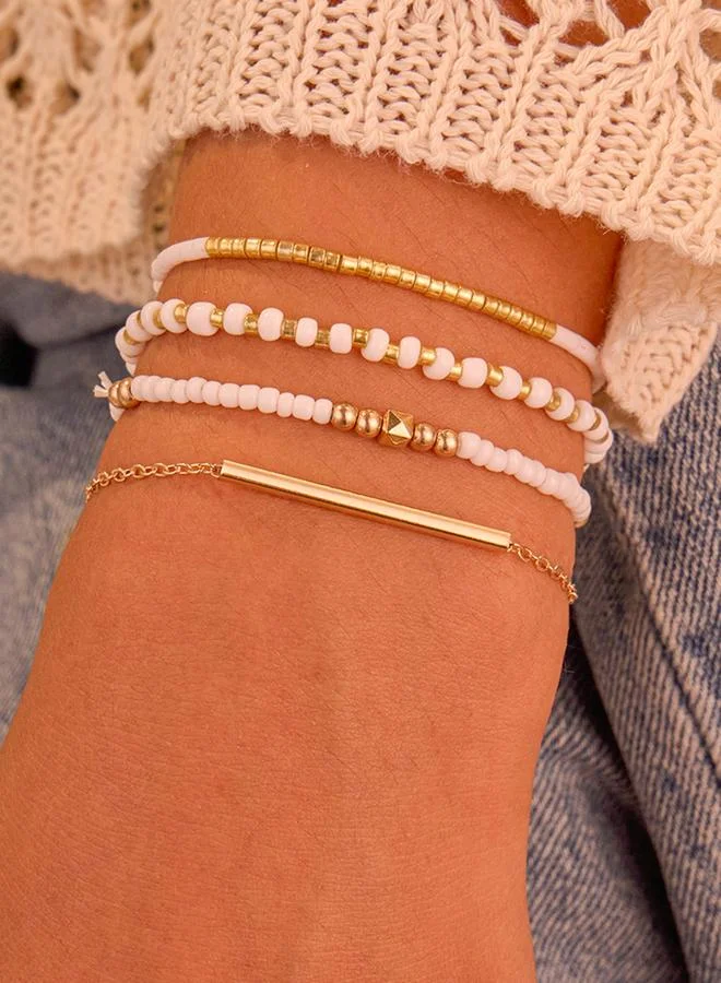 تايك تو مجموعة من 4 - أساور ذهبية مزينة بالخرز