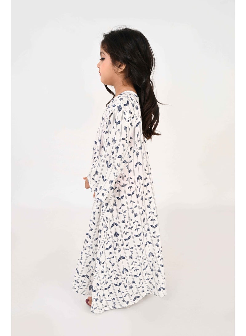 Linelle Kids Jalabiya – White Base with Blue Leaf-Like Prints and Embroidered Neckline - Image 5