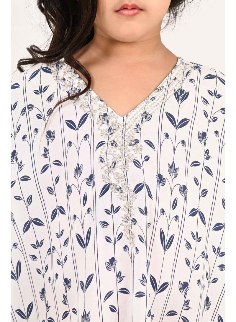 Linelle Kids Jalabiya – White Base with Blue Leaf-Like Prints and Embroidered Neckline - Image 2