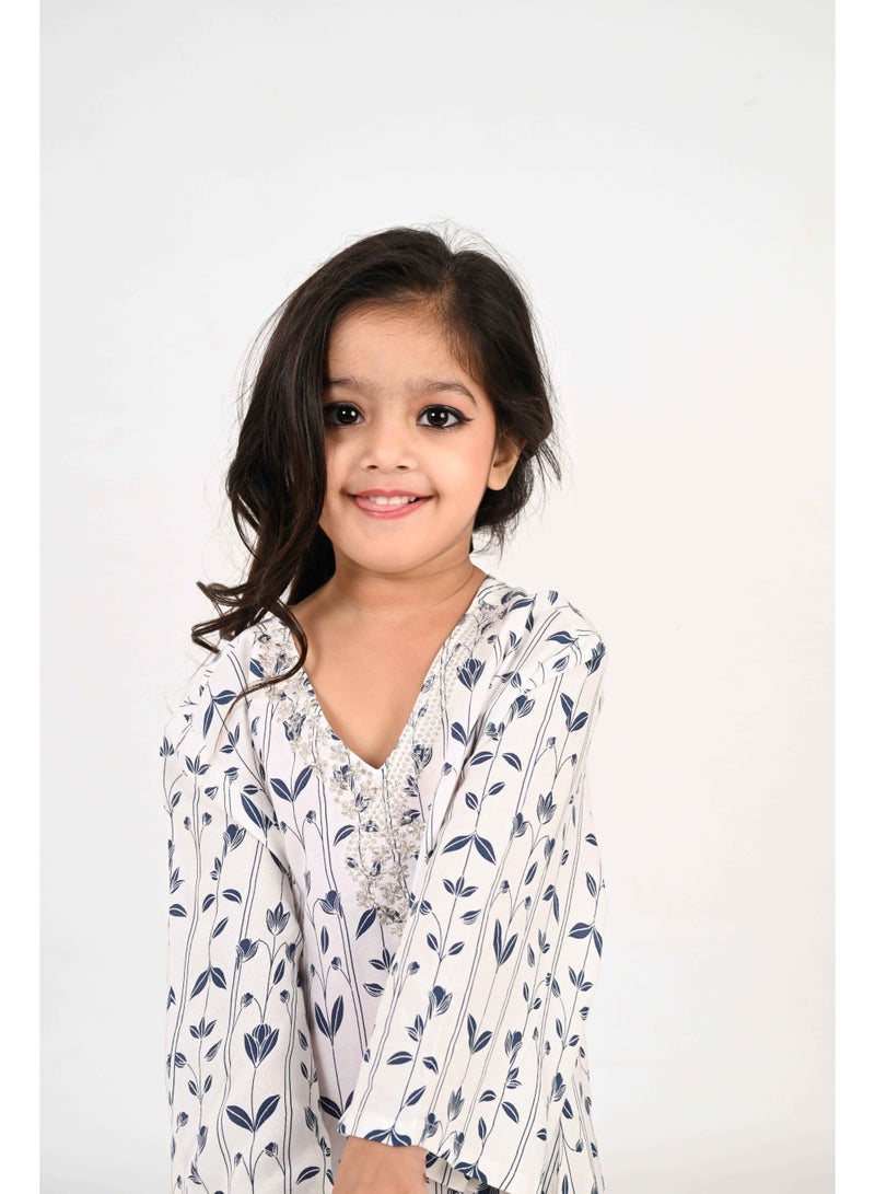 Linelle Kids Jalabiya – White Base with Blue Leaf-Like Prints and Embroidered Neckline - Image 3
