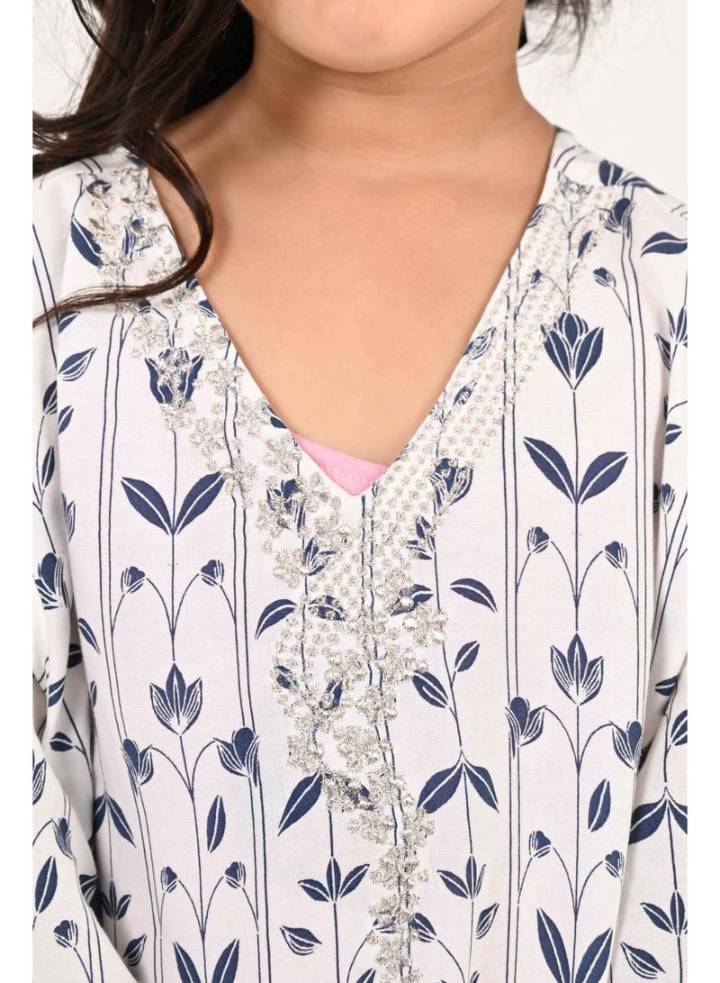 Linelle Kids Jalabiya – White Base with Blue Leaf-Like Prints and Embroidered Neckline - Image 4