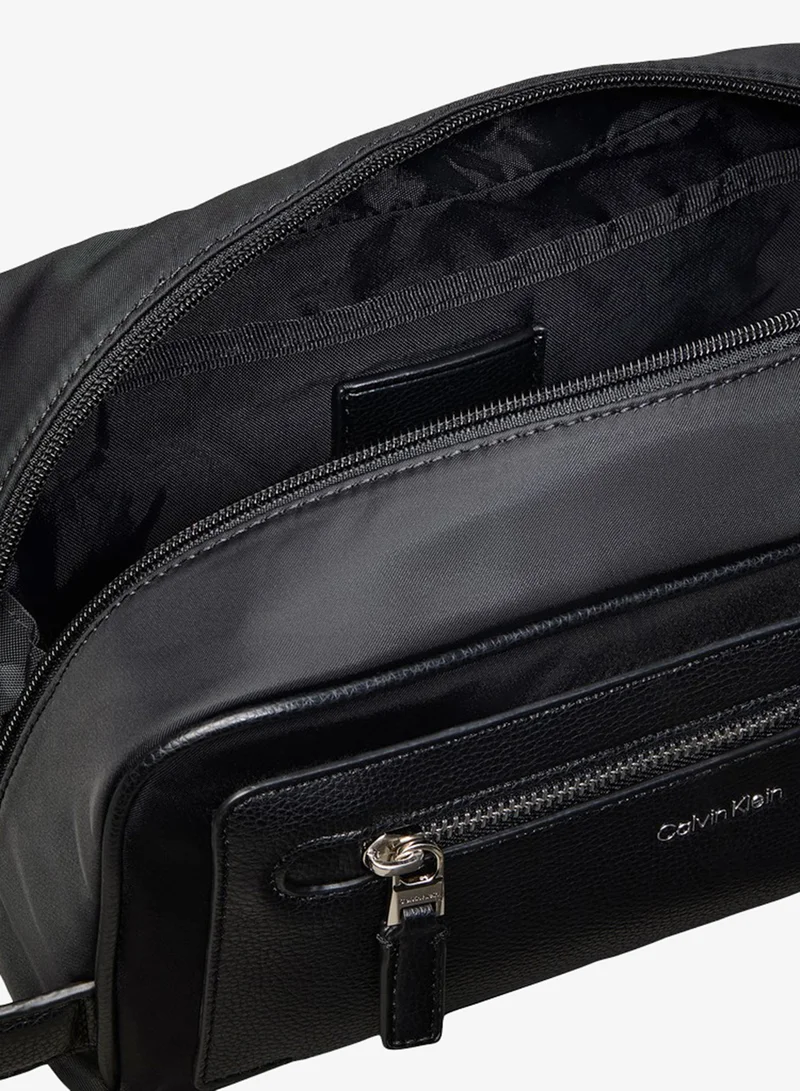 Calvin Klein  Raised Logo Dopp Kit  | Best Price UAE