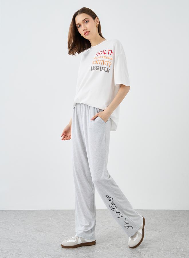 Take Two Women Grey Slogan Print Wide Leg Joggers with Elastic Waistband - Image 1