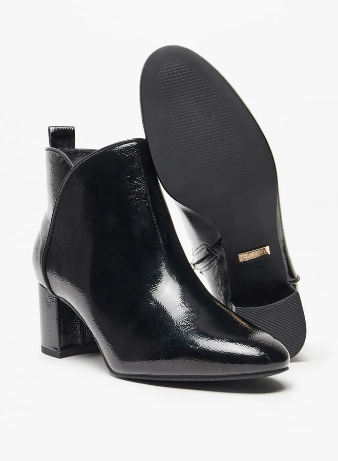 سيليست Women's Solid Ankle Boots with Block Heel and Zip Closure