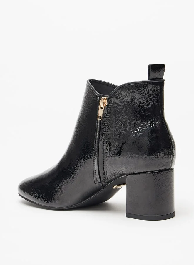 سيليست Women's Solid Ankle Boots with Block Heel and Zip Closure