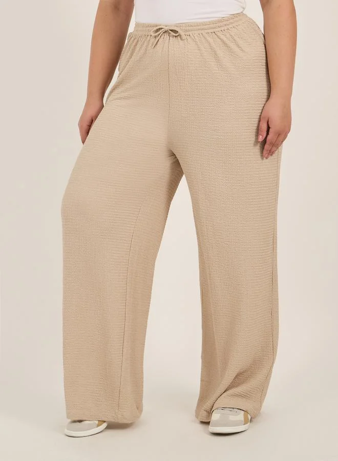 Styli Plus Size Textured Wide Leg Trousers with Drawstring