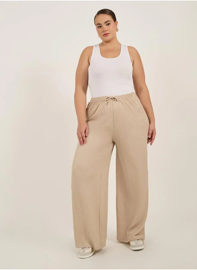Styli Plus Size Textured Wide Leg Trousers with Drawstring