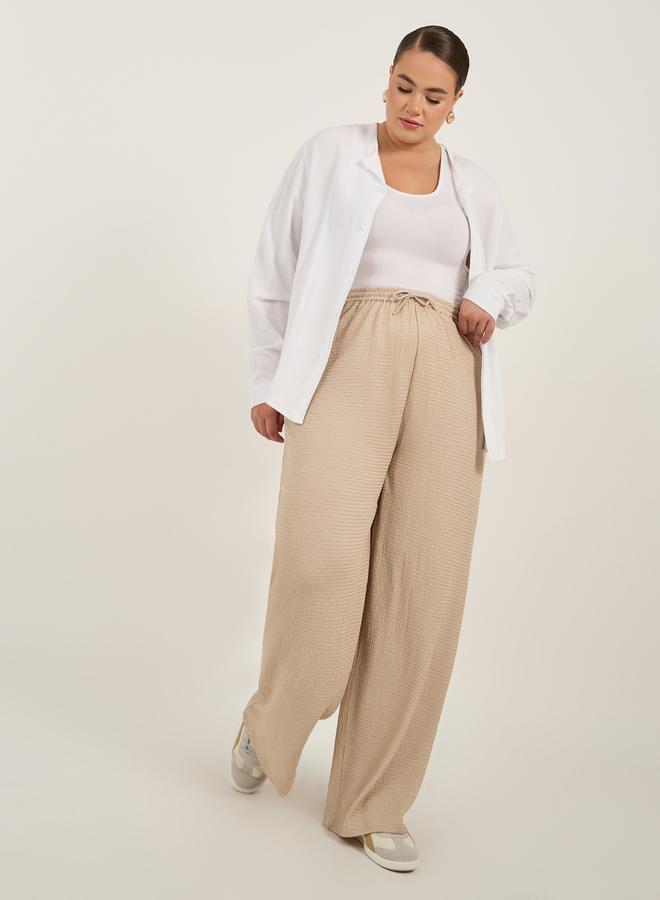 Styli Plus Size Textured Wide Leg Trousers with Drawstring - Image 1