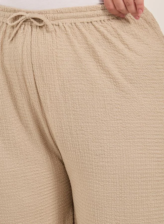 Styli Plus Size Textured Wide Leg Trousers with Drawstring
