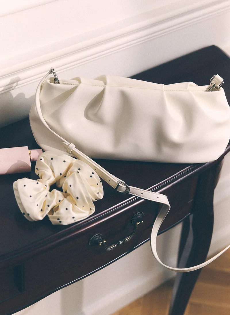 Lichi  Voluminous eco-leather clutch bag with a thin strap for Women | Best Price UAE