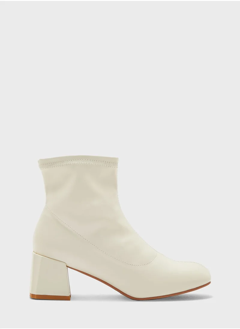 ايلا Rounded Point Sock Ankle Boot