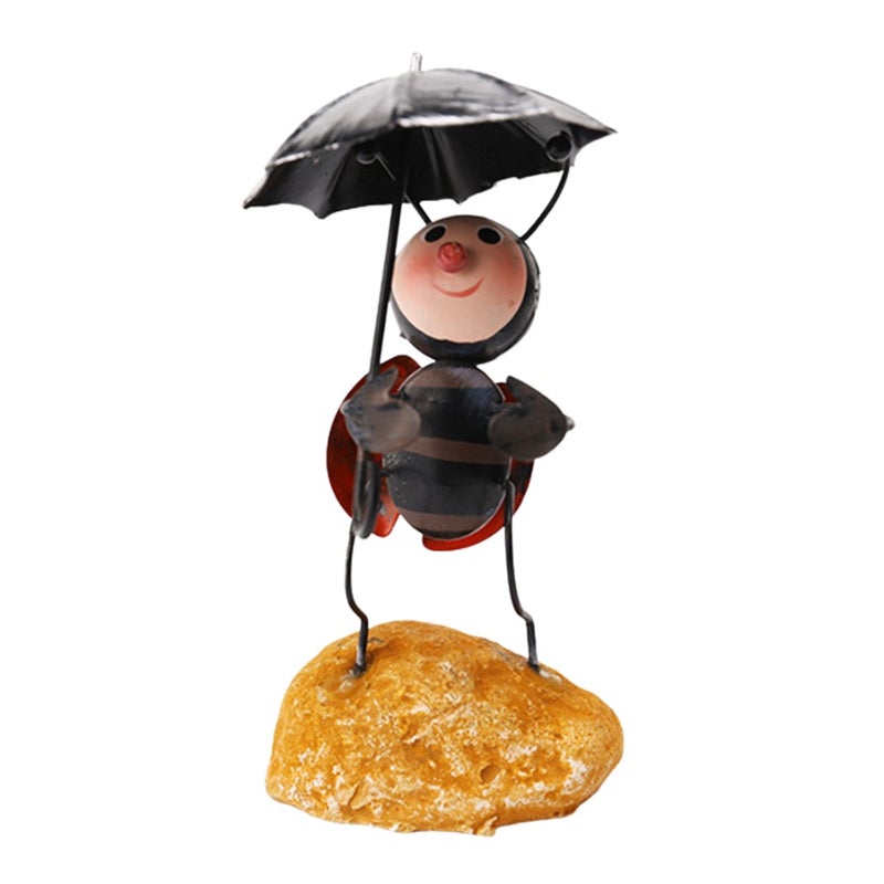 Whimsical Ladybug Metal Sculpture Handcrafted garden and home decor in bright colors and durable iron and resin design Ladybug holding umbrella - Image 1