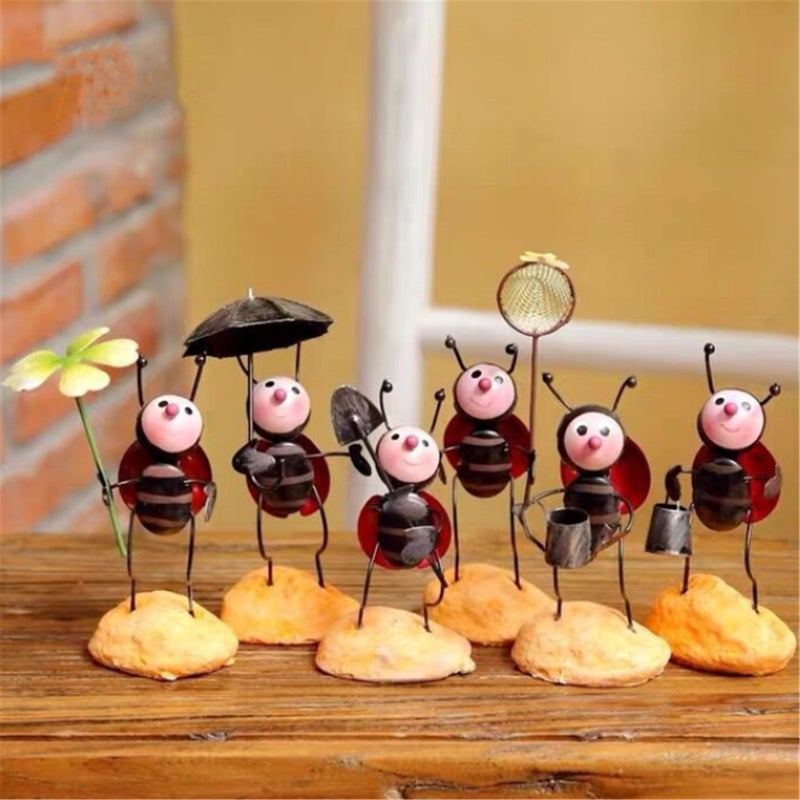 Whimsical Ladybug Metal Sculpture Handcrafted garden and home decor in bright colors and durable iron and resin design Ladybug holding umbrella - Image 4