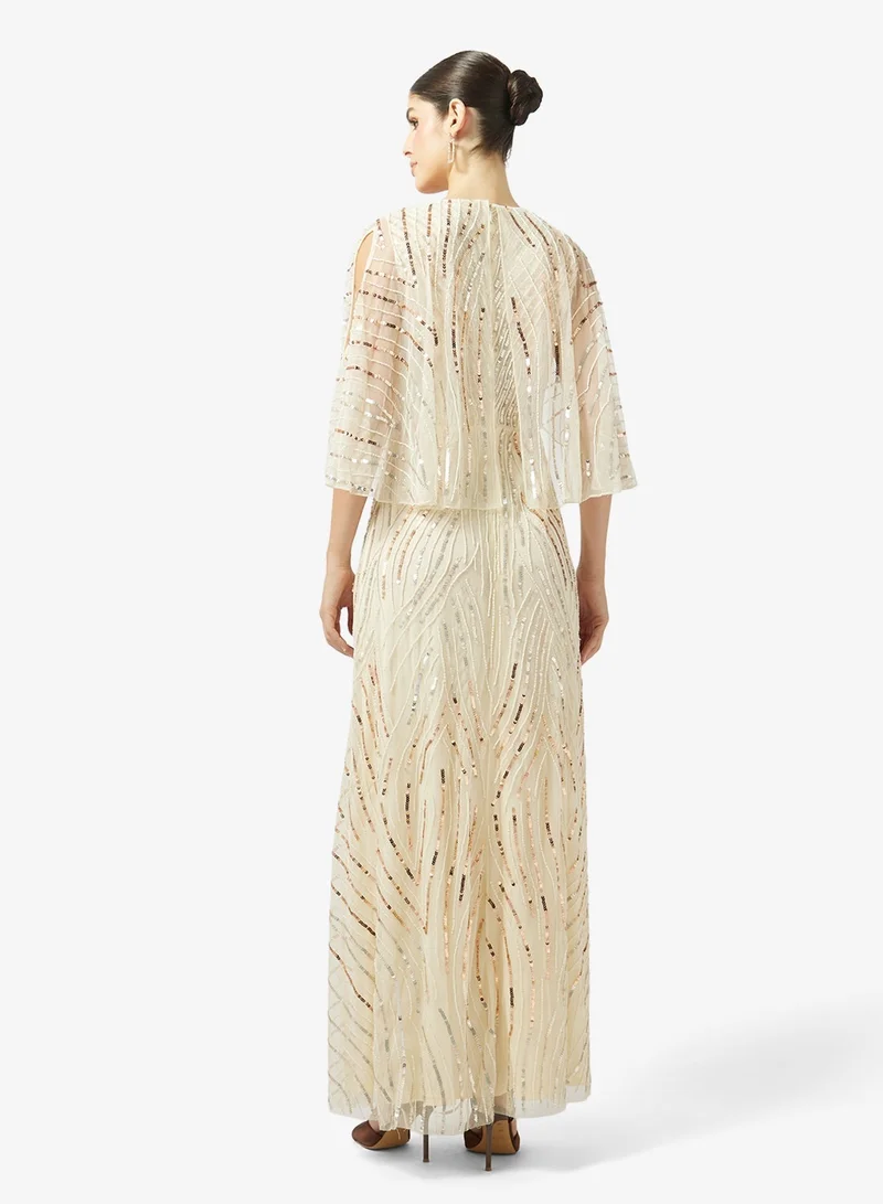 اميليا روز فستان ماكسي مزين بالترتر