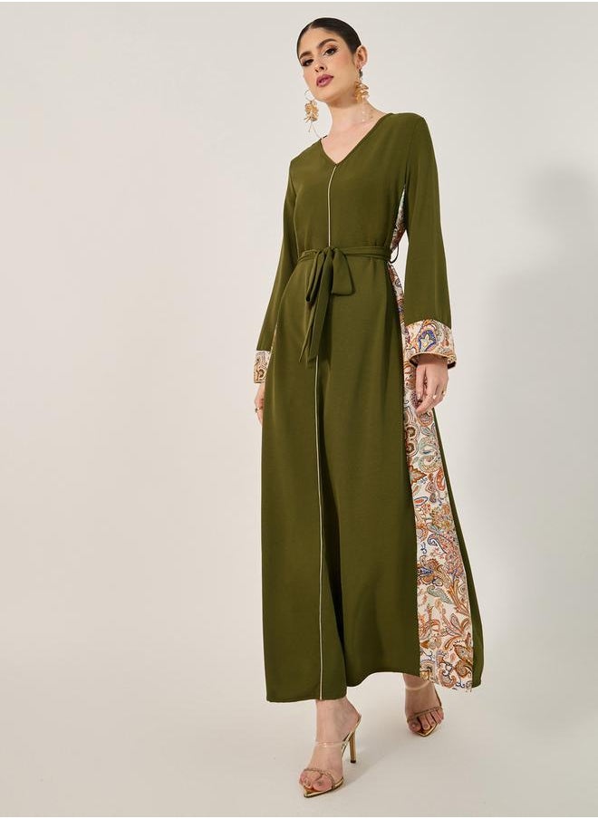 Styli - navy olive colour jalabiya w/ navy blue pailsey print inserts at sides and slv cuff w/ gold cord trim at CF and sleeve hem - Image 1