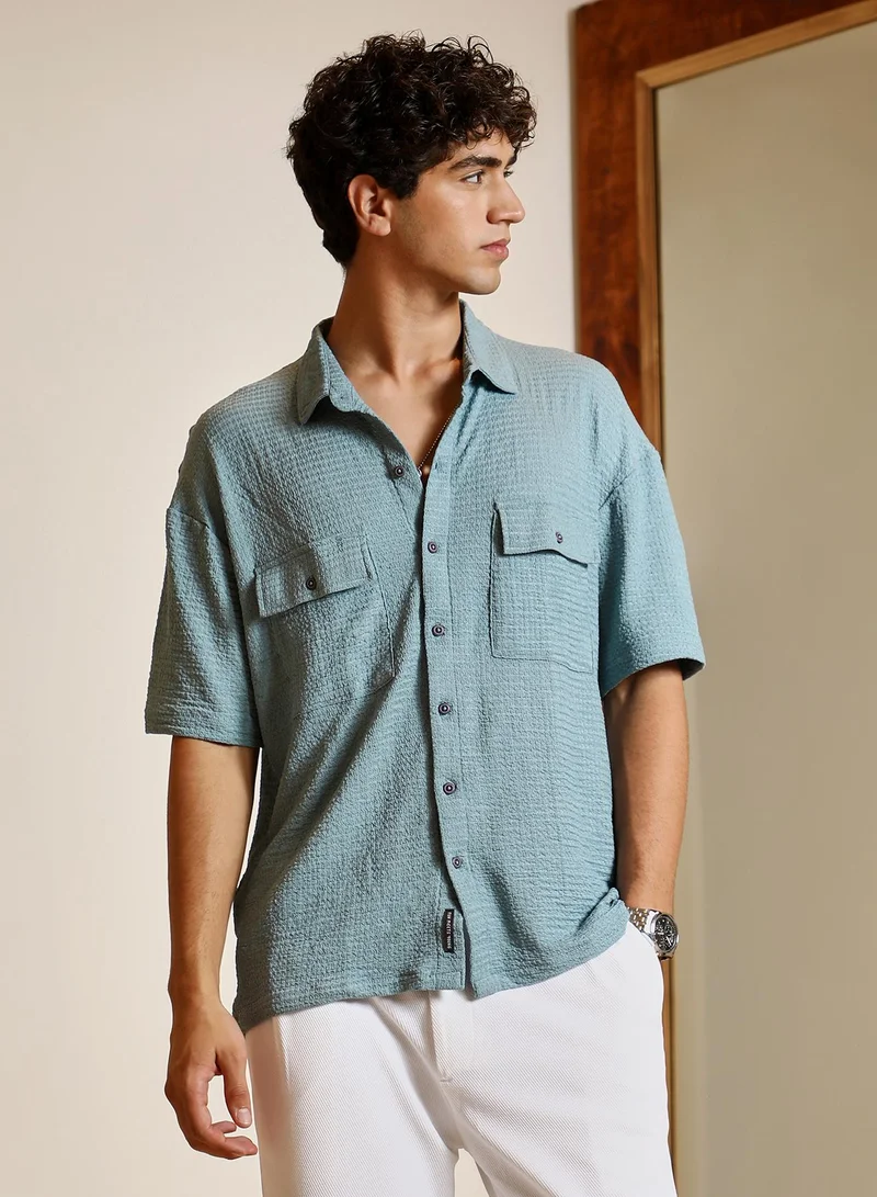 كامبوس سوترا Campus Sutra Men Tactile-Utility Oversized Shirt | Spread Collar Short Regular Sleeves | Button Closure Straight Hem | Solid Textured | Woven Fabric For Street & Casual Wear | Sage Green