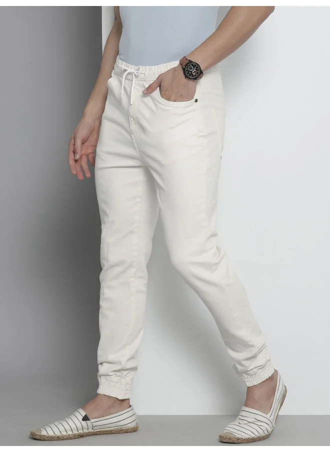 The Indian Garage Co Men White Cotton Stretchable Slim Fit Denim Jogger