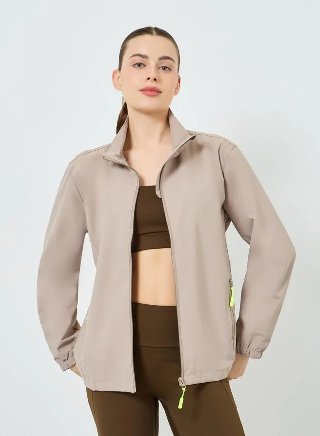 Styli Active  Women Beige Windbreaker Contrast Zip Jacket for Women | Best Price UAE