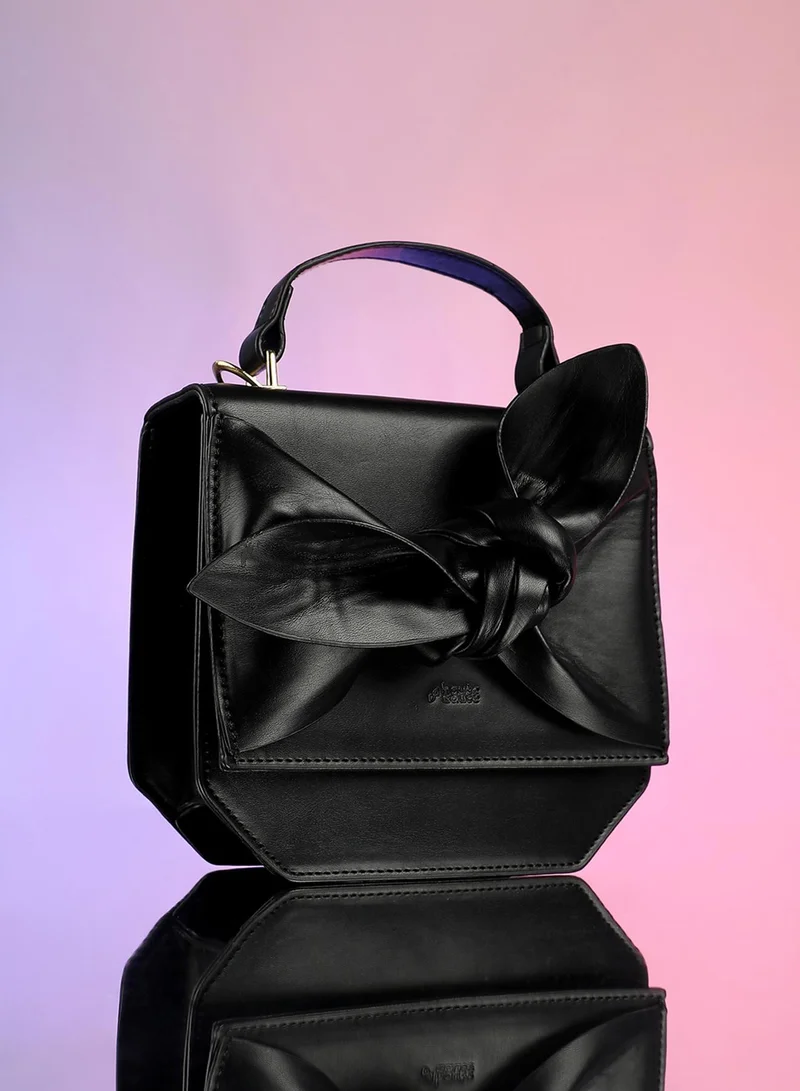 صوص هاوت شنطة بحمالة انيقة بحجم عادي من الجلد النباتي  بإغلاق مغناطيسي للنساء