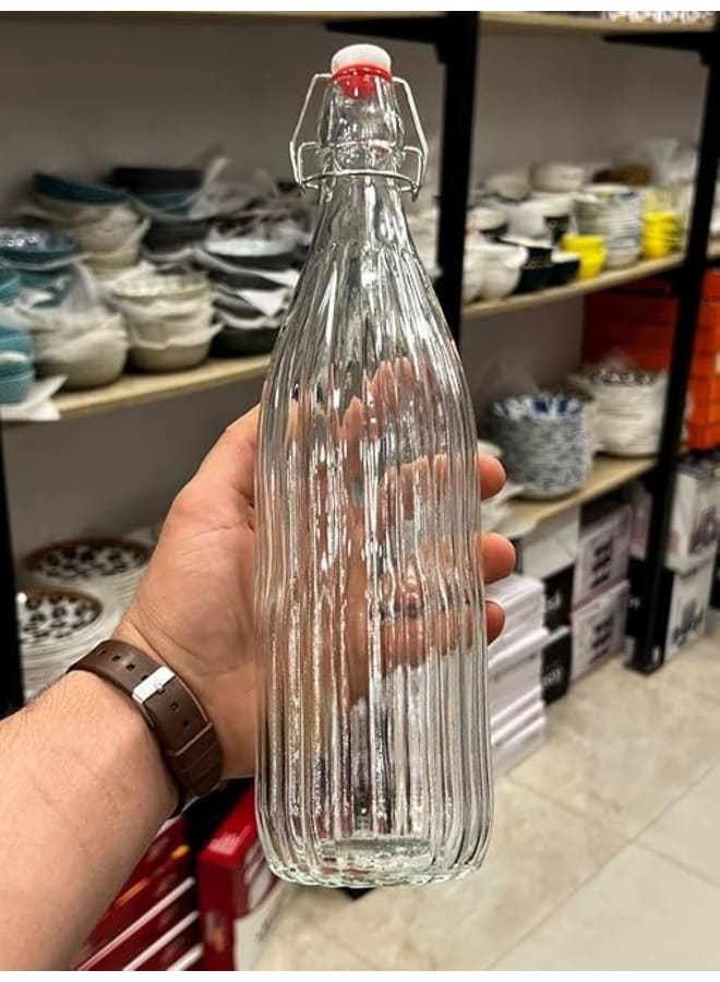 جاجة ماء زجاجية بسعة 1.5 لتر، بتصميم مخدد وغطاء علوي محكم الغلق. (شفافة) - Image 1
