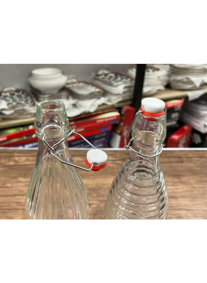 جاجة ماء زجاجية بسعة 1.5 لتر، بتصميم مخدد وغطاء علوي محكم الغلق. (شفافة) - Image 2