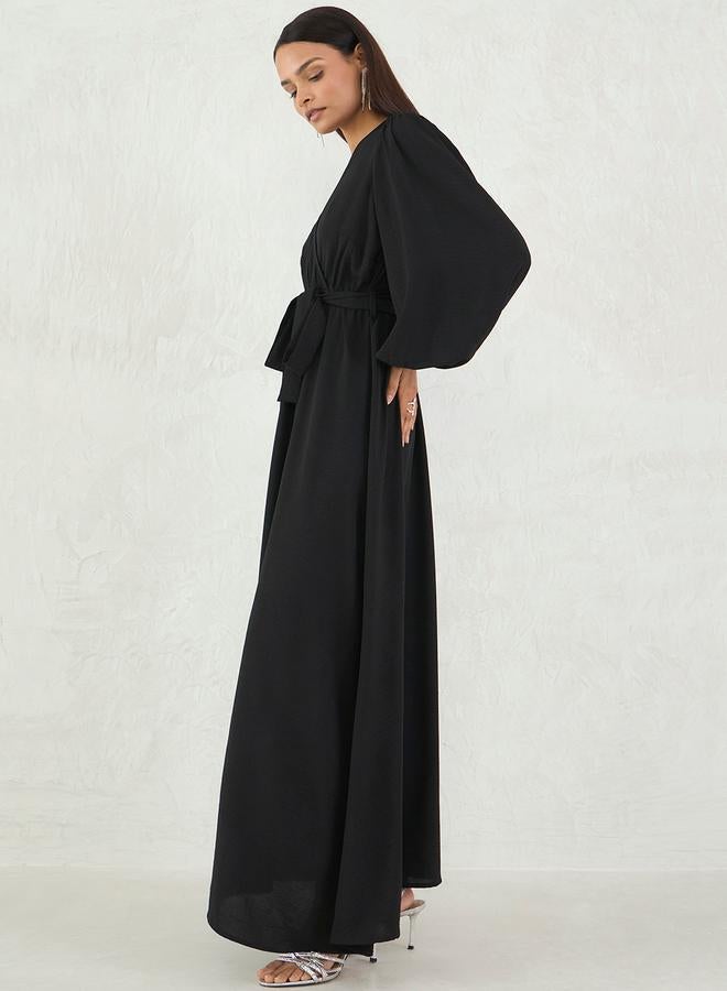 Femmella Black Solid V Neck Wrap Look A-Line Maxi Dress - Image 3