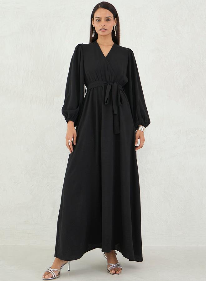 Femmella Black Solid V Neck Wrap Look A-Line Maxi Dress - Image 1