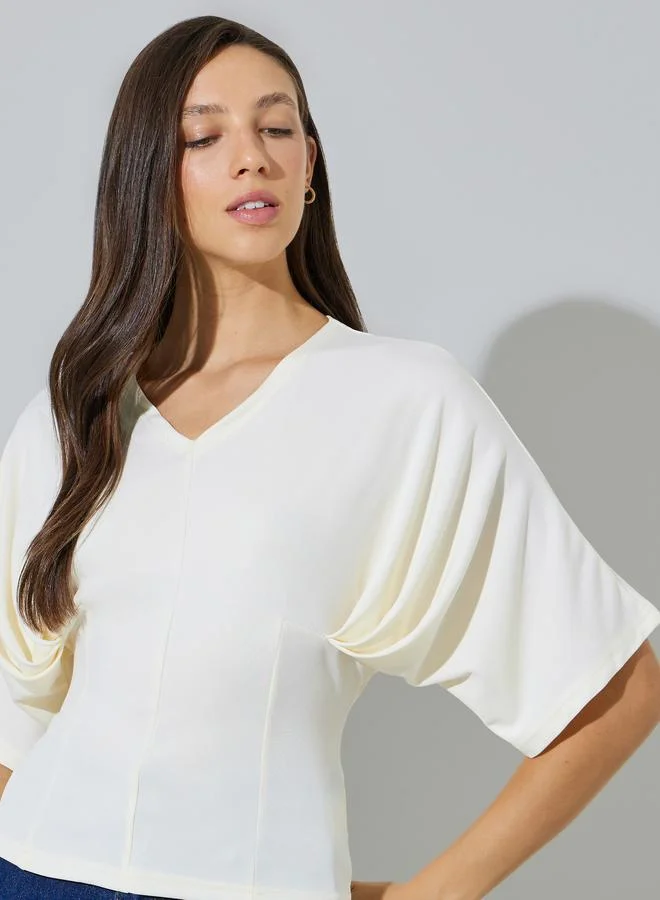 ستايلي Beige Knit Top with Dolman Sleeves