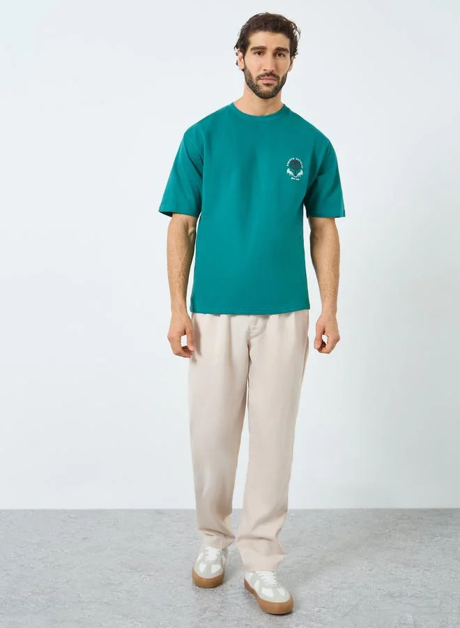 Styli Men Teal Patch Graphic Oversized T-Shirt