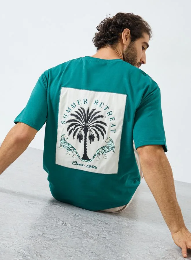 Styli Men Teal Patch Graphic Oversized T-Shirt