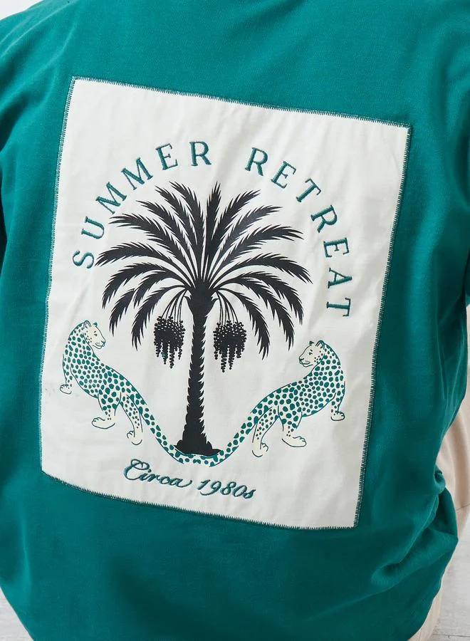 Styli Men Teal Patch Graphic Oversized T-Shirt