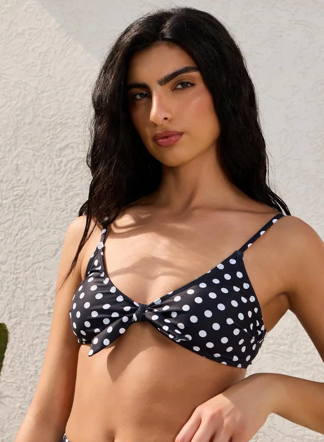 Styli POLKA DOT PRINT TIE BIKINI WITH TIE DETAIL IN THE FRONT & HIGH LEG BRIEF BOTTOM