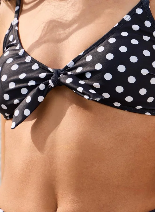 Styli  POLKA DOT PRINT TIE BIKINI WITH TIE DETAIL IN THE FRONT & HIGH LEG BRIEF BOTTOM for Women | Best Price UAE