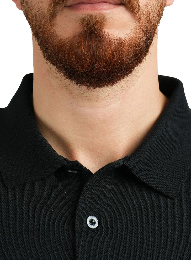 جيوردانو قميص بولو رجالي عالي الأداء بقصّة Slim Fit مطرز بنقشة أسد