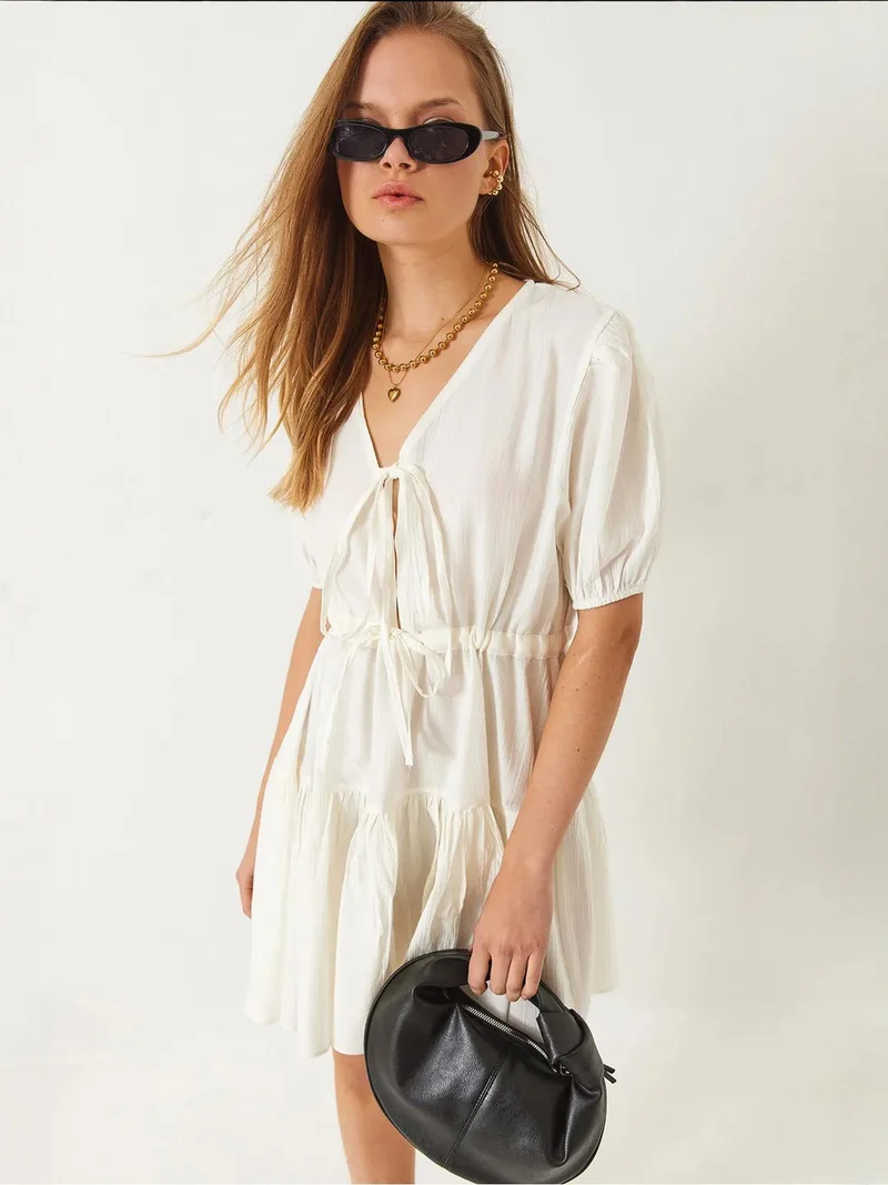 بيانكو لوتشي فستان لوتشي ميني بياقة على شكل حرف  مع فيونكة