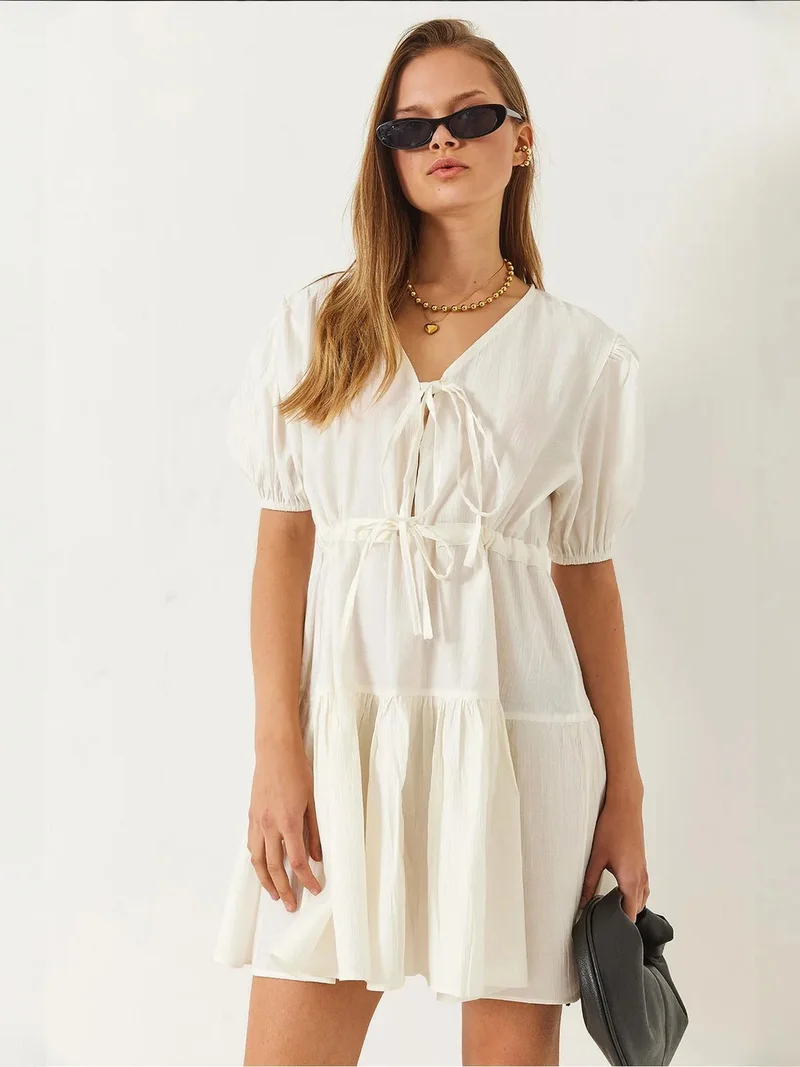 بيانكو لوتشي فستان لوتشي ميني بياقة على شكل حرف  مع فيونكة