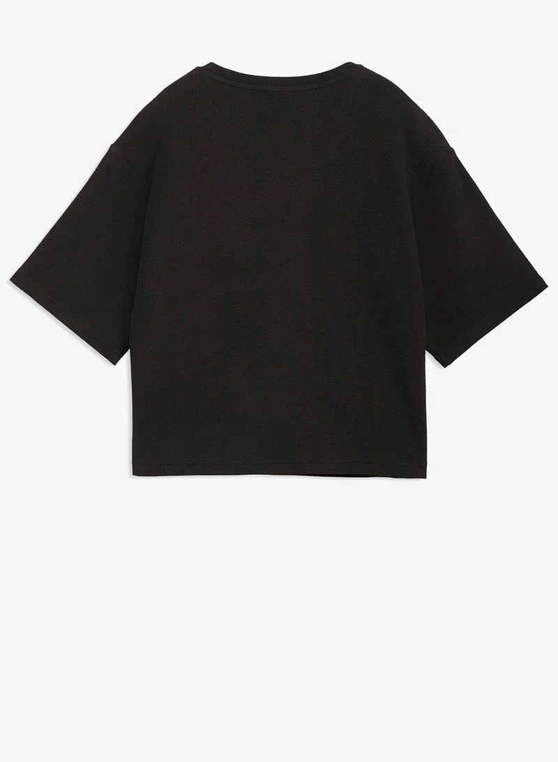 PUMA  Essential Elevated Relaxed T-Shirt for Women | Best Price UAE