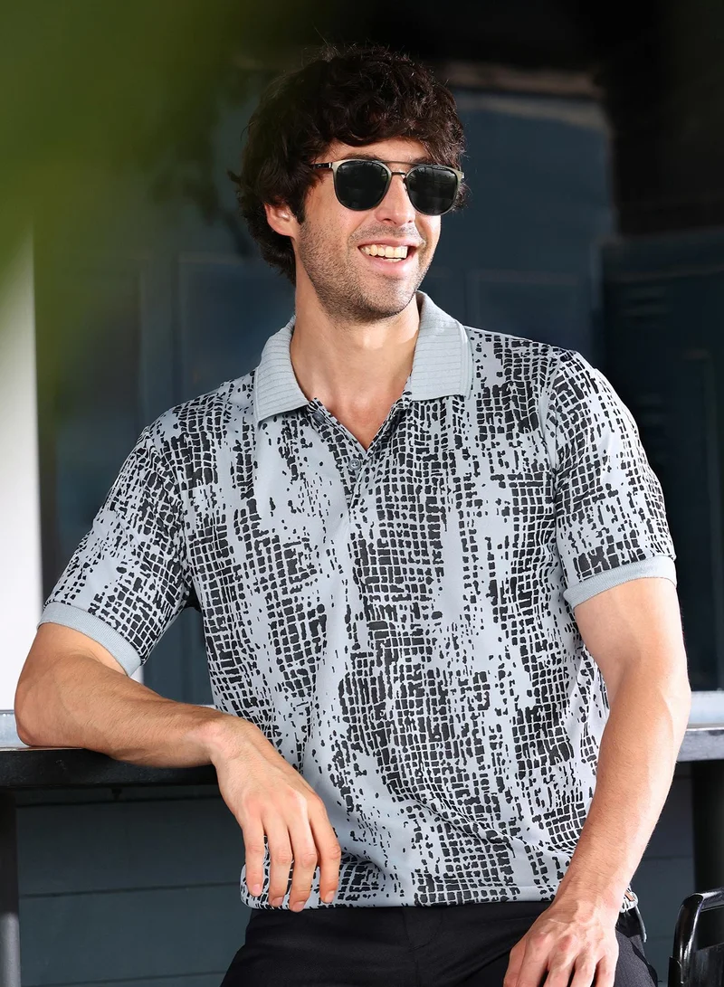 Campus Sutra Men Abstract-Gravel Print Polo T-Shirt | Jacquard Polo Neck, Short Ribbed-Cuff Sleeves | Half-Button , Straight Hem | Abstract Print Pique | Knitted Fabric For Casual & Daily Wear | Coin Grey & Midnight Black