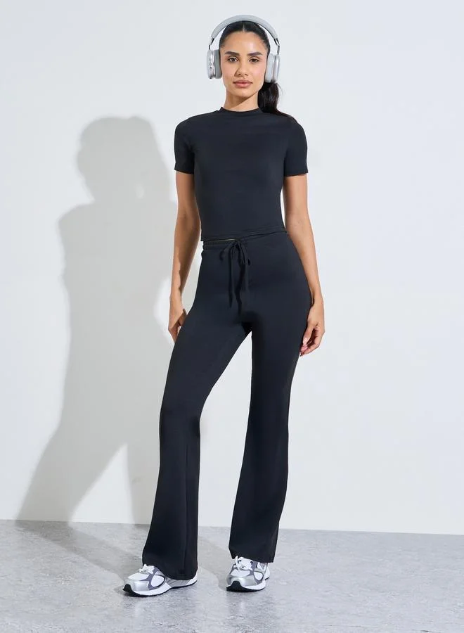 Black Solid Fitted T-Shirt And Flared Pants Active Set