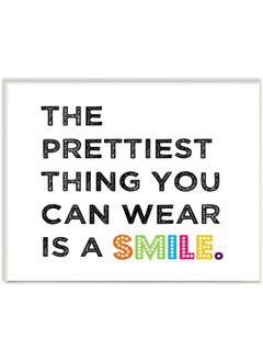 Stupell Industries The Kids Room by The Prettiest Thing You Can Wear Is A Smile Textual Art Wall Plaque  - Image 1