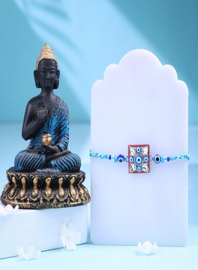 Floweraura راخي فاخر مصنوع يدويًا من فلاورورا، بتصميم عين شريرة نابضة بالحياة، مع تمثال بوذا - هدية مثالية للأخ، أو أبناء العم، أو كهدية مميزة في عيد راكشا باندهان. - Image 1