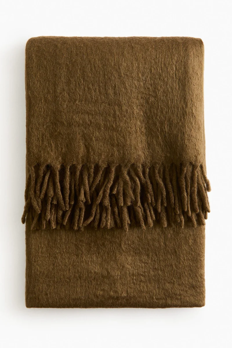 اتش اند ام بطانية مزينة بشرّابات